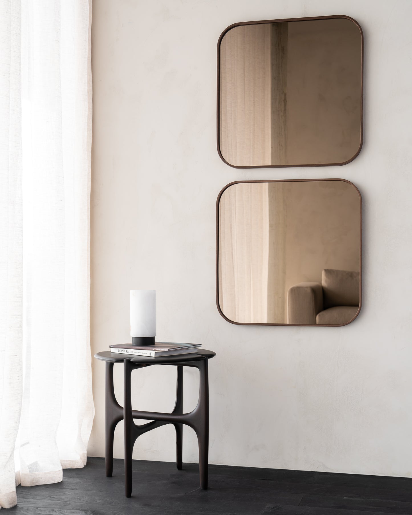 Camber wall mirror