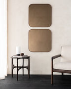 Camber wall mirror